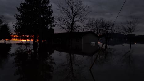 slow-moving shot of the flood in abbotsford in british columbia at night time