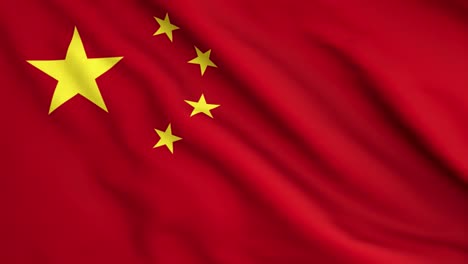 a closeup of the flag of china waving in the wind