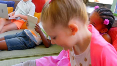 School-children-having-fun-in-the-school-library-4k