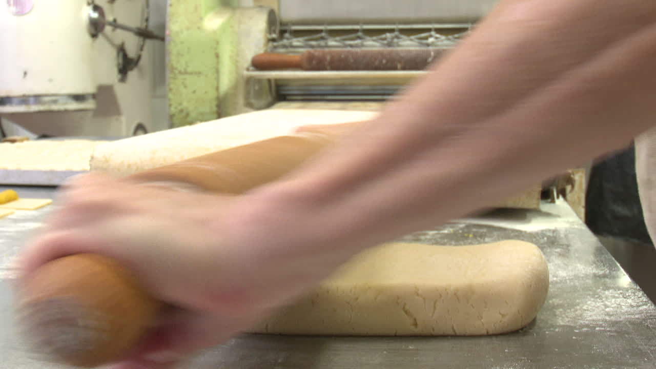 Bakery worker making pastries