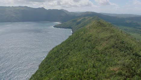 aerial view of loma papa gorda lush promontory and bay, samana, dominican republic