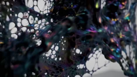 transformative fluidity: a captivating exploration of colorful iridescent bubbles and organic shapes in motion, evoking depth and textural wonder