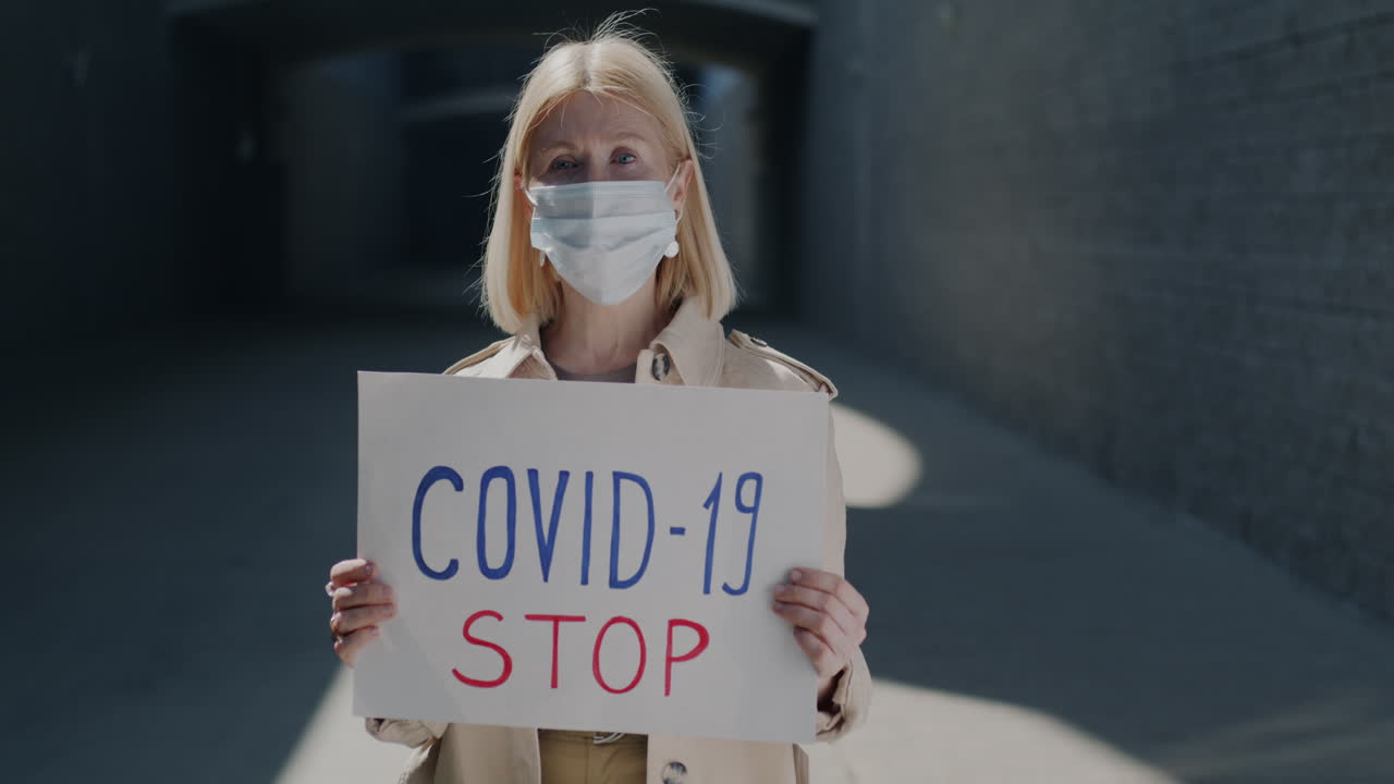 Woman protesting COVID-19