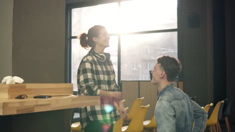 Two-Young-People-Laughing-And-Enjoying-Their-Time-Together