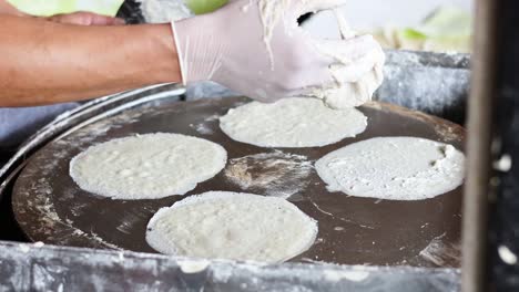 preparing and cooking crepes on hot griddle