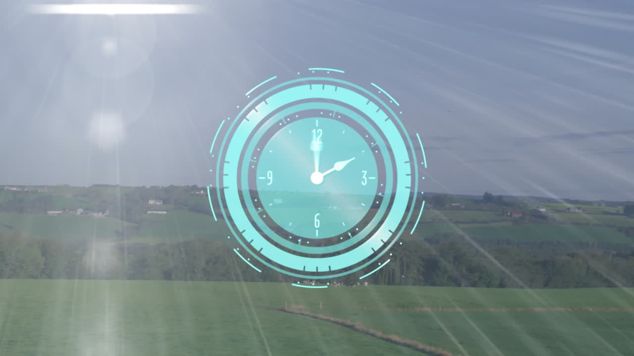 Sunlight streaming over countryside landscape with clock animation in foreground
