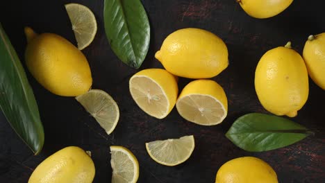 pieces of fresh lemon with leaves slowly rotate.