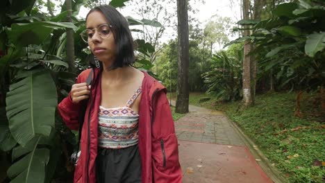 Moody-girl-walking-through-nature-path