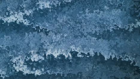 beautiful animation of different shades of blue oil paint abstract moving towards left