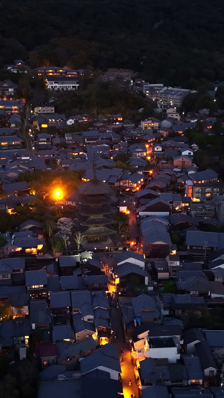 Aerial drone view of the Yasaka Shrine in the evening in Kyoto, Japan