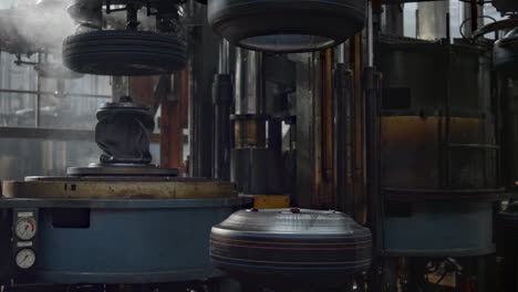 mechanical tyre production machine working at automotive workshop fast motion