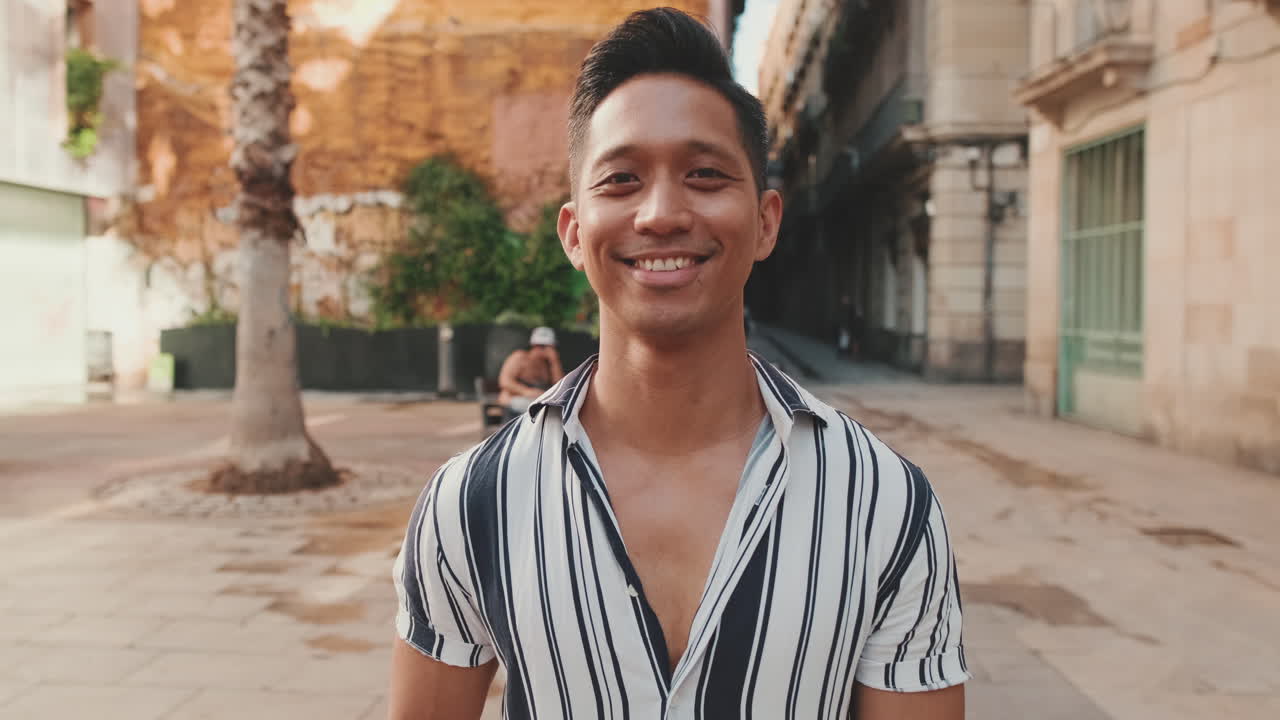 Portrait of a smiling man in the city