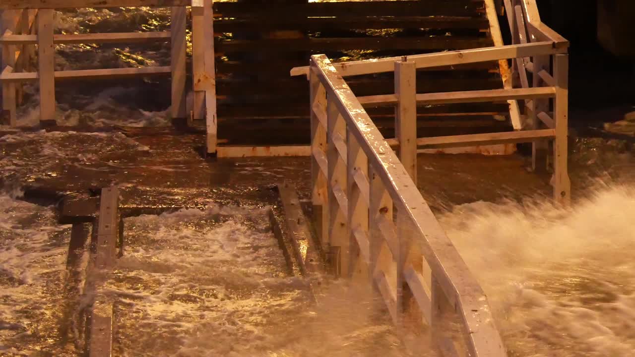 Rough Sea Waves Crashing on Wooden Pier Gdansk Poland