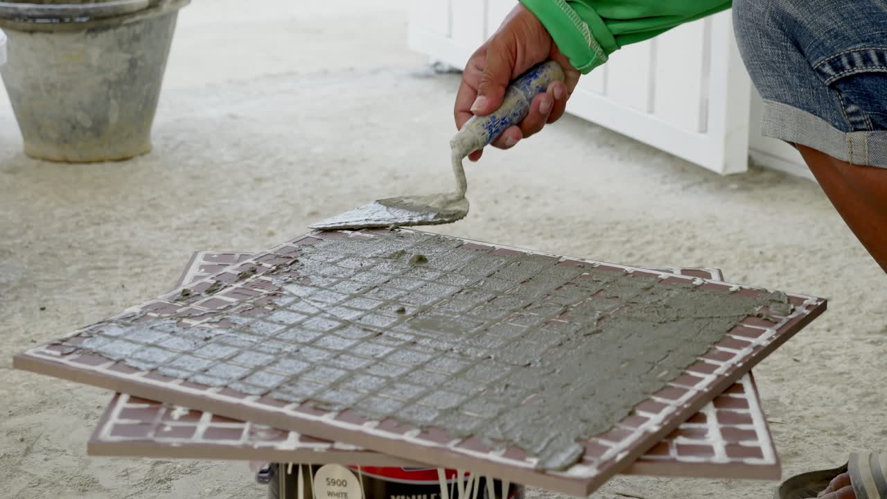 A detailed guide showcasing step-by-step process of applying concrete tiles