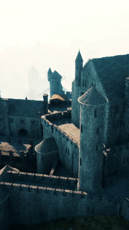 aerial view of a medieval castle in a misty morning