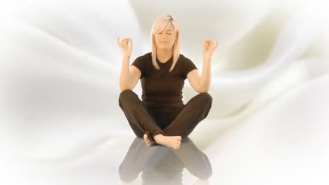 woman practicising yoga on her own