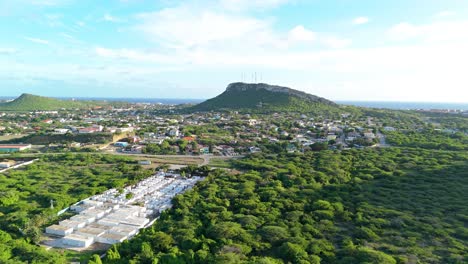 Aerial-overview-above-cemetery-next-to-Wishi-area-in-Willemstad-Curacao-at-midday