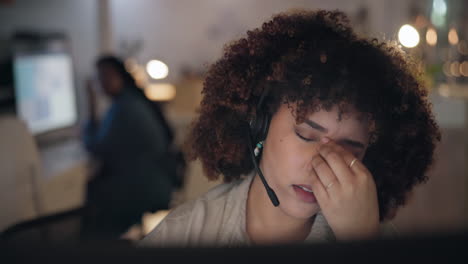 headache, tired and stress of woman in call center