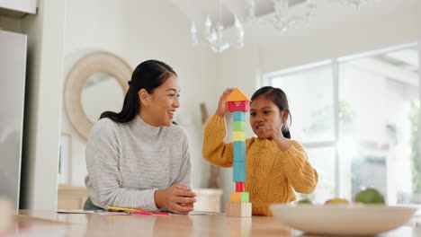 Bonding,-smile-and-mom-playing-with-building