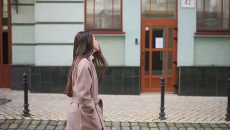 woman walking on city street