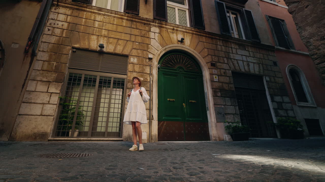 Woman standing in front of a building