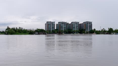 low condominium in bangkok city near chao phraya river at twilight view time