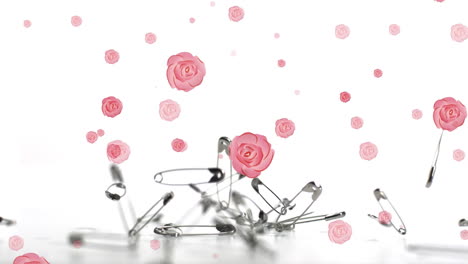 animación de rosas que caen sobre alfileres de seguridad sobre fondo blanco