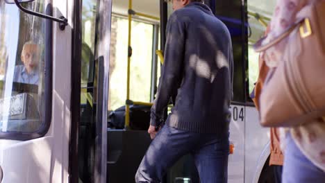 Commuters-boarding-bus-4k