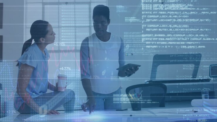 Animation of statistical data processing against two diverse women discussing over a plan at office