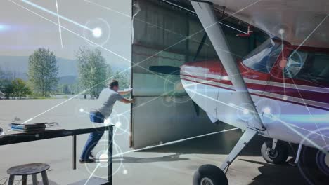 animación del globo de la red de conexiones sobre el avión en el hangar