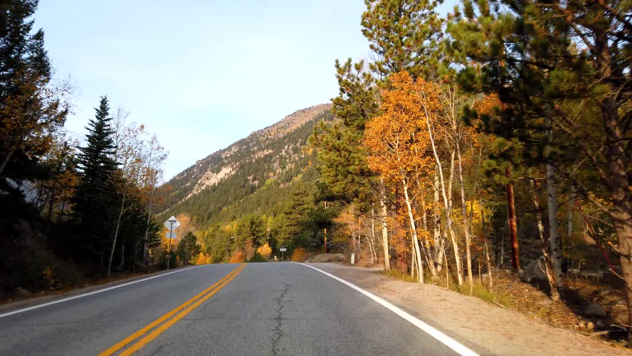 Fall foliage POV driving in the Rocky Mountains of Colorado