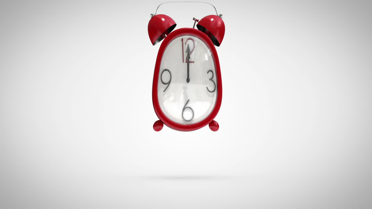 귀여운 알람 시계가 자정까지 세고 있습니다.