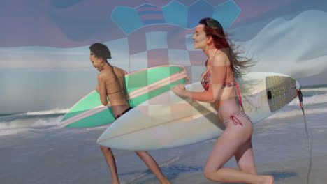 running on beach, two women carrying surfboards with croatian flag animation