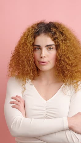woman expressing different emotions on pink background