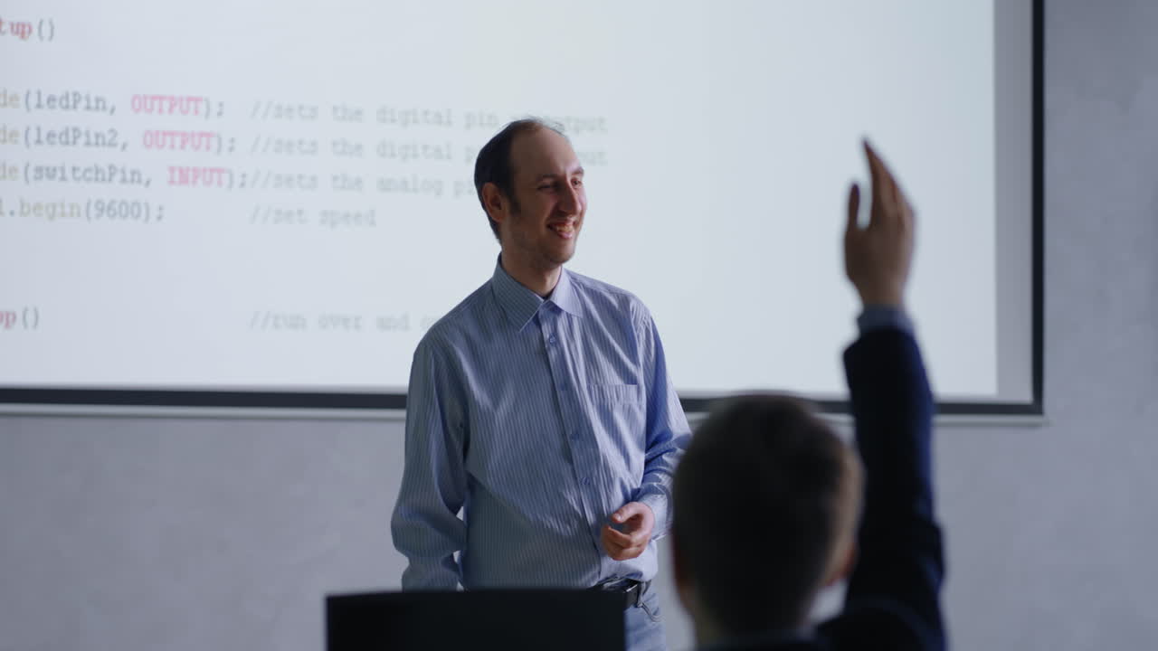 conferencia de codificación - estudiantes haciendo preguntas