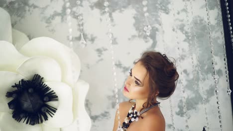 elegant woman posing in dress. beautiful elegant woman posing in black dress
