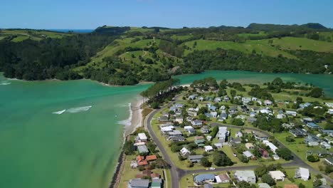 coastal flight along rockwell of cooks beach in new zealand