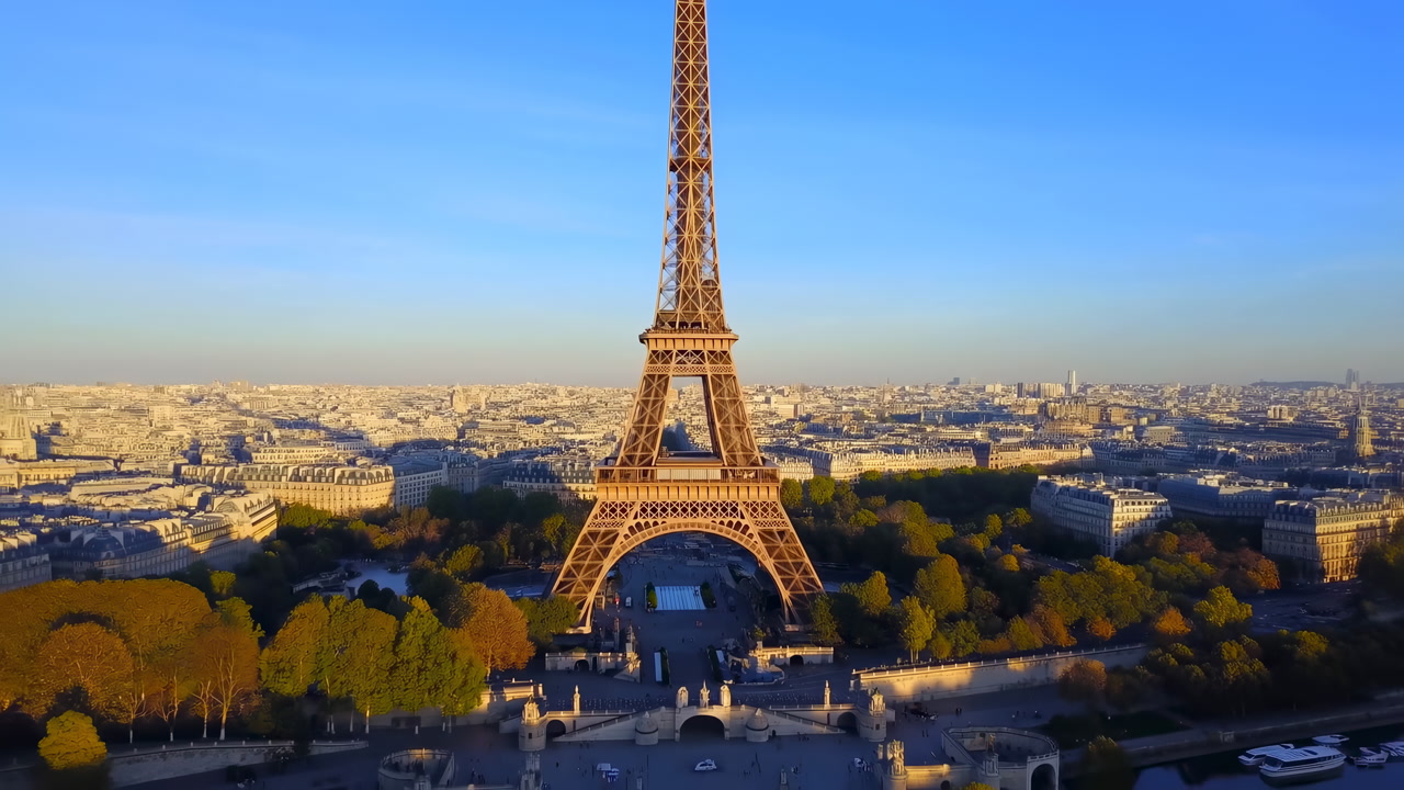 Eiffel Tower Sunrise Paris Skyline Aerial View Golden Light Bathing Iron Structure, Treelined Champ De Mars,