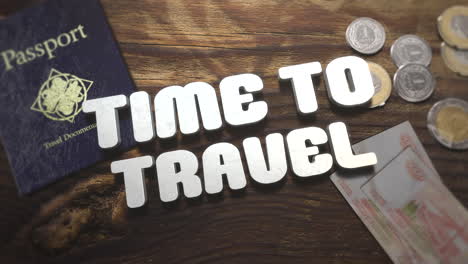 tiempo para viajar con pasaporte de viaje y dinero en madera