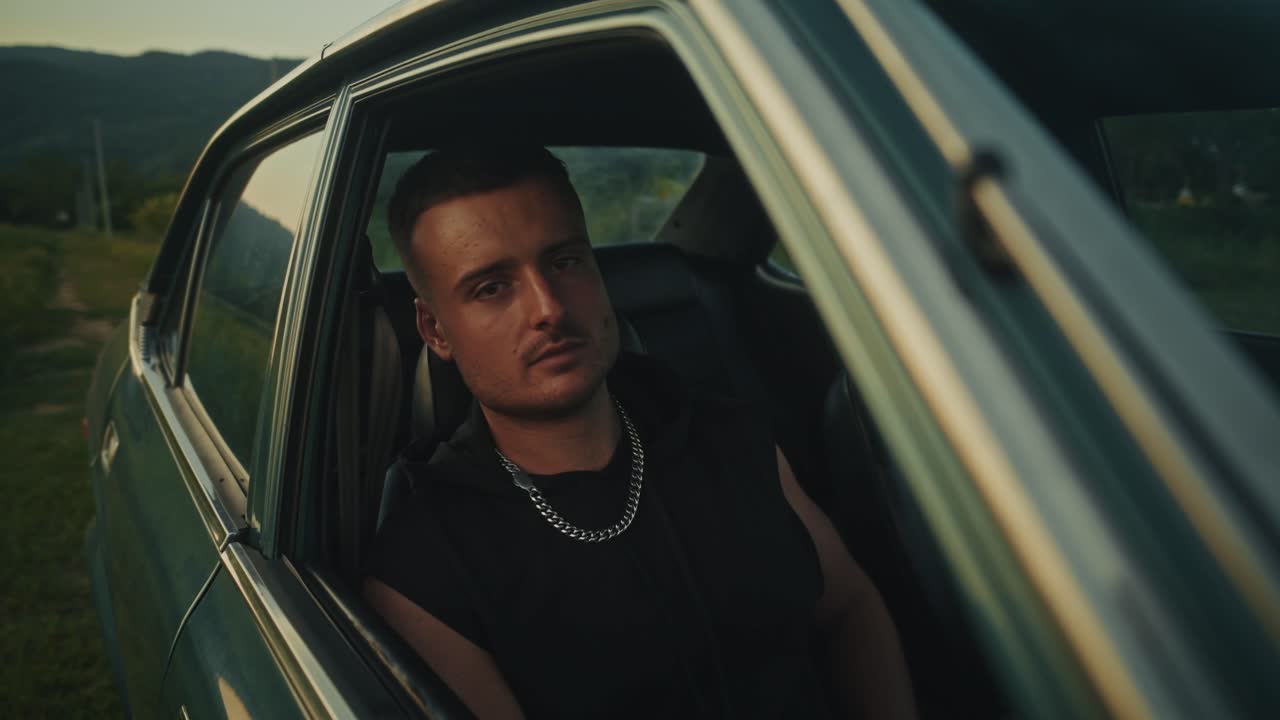 Man in a Vintage Car