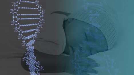 animación de cadenas de adn azules en 3d girando sobre un bebé dormido