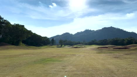 sunny day at a picturesque golf course