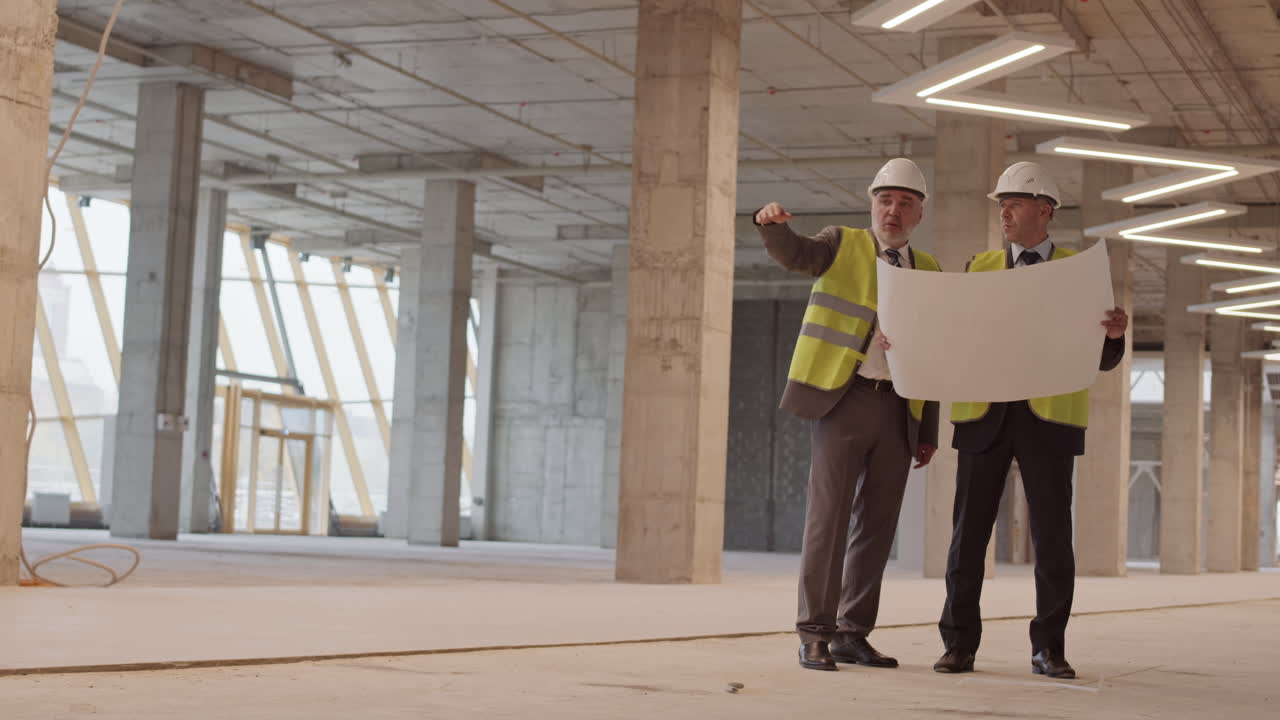 Architects Wearing Masks Working in Building