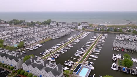 Marina-in-New-Buffalo,-Michigan-along-Lake-Michigan-with-drone-video-moving-in