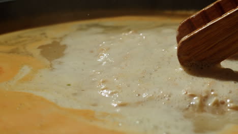 boiling soup in a pan