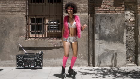 cool roller skating woman dances and skates outside in an urban setting