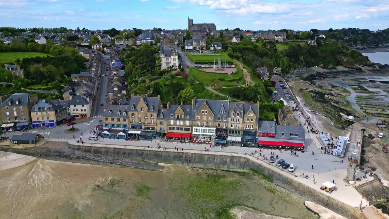 Cancale promenade and beach during low tide with oyster beds or parks