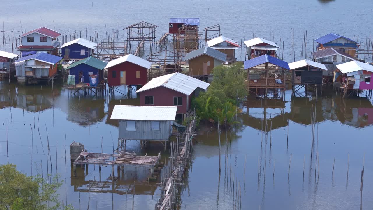 Houses on Stilts in a Water Village