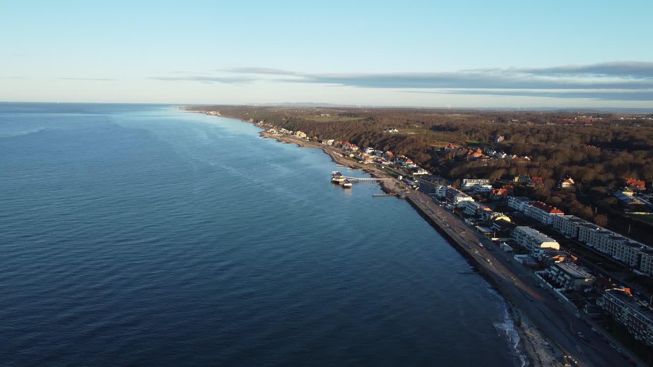Aerial view of a coastal town along the sea