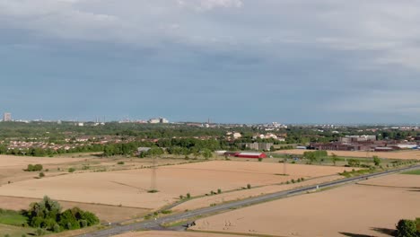 Aerial-bird's-eye-view-over-city-Lund-skyline-and-Swedish-countryside